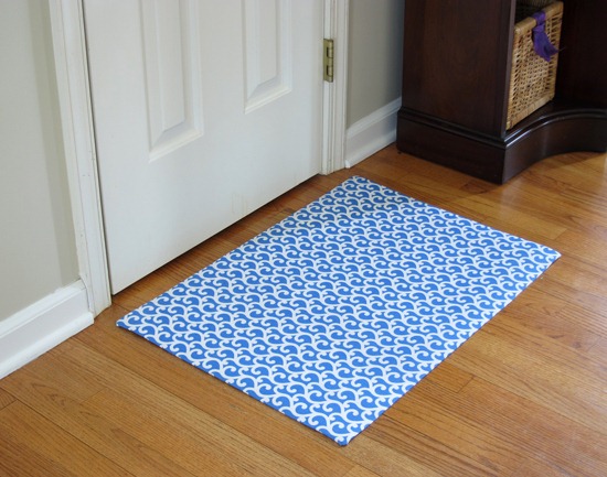 Fabric Covered Vinyl Rug